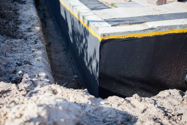 Professional Emergency Waterproofing technician working in Camden, NJ